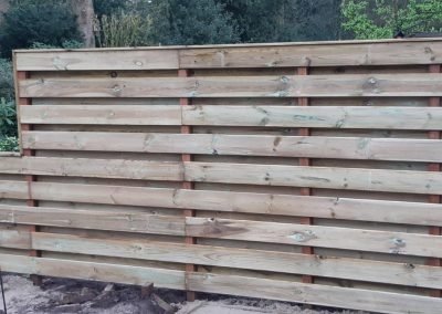 houtenschutting tuin aanleg gooi